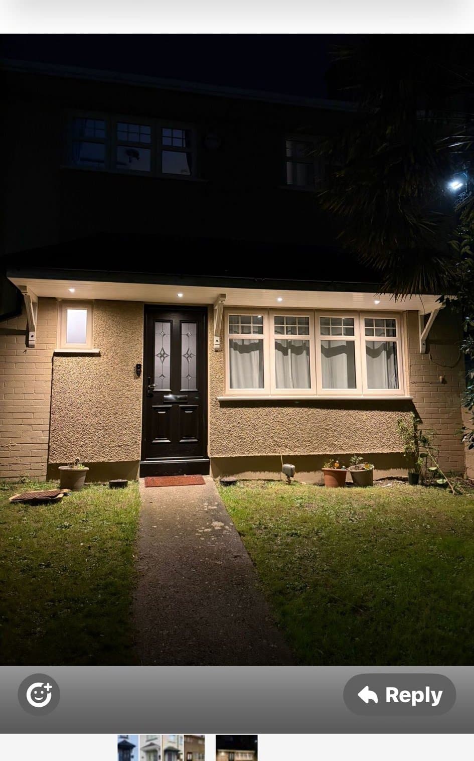 Lean-to canopy with downlights on detached house illuminated at night