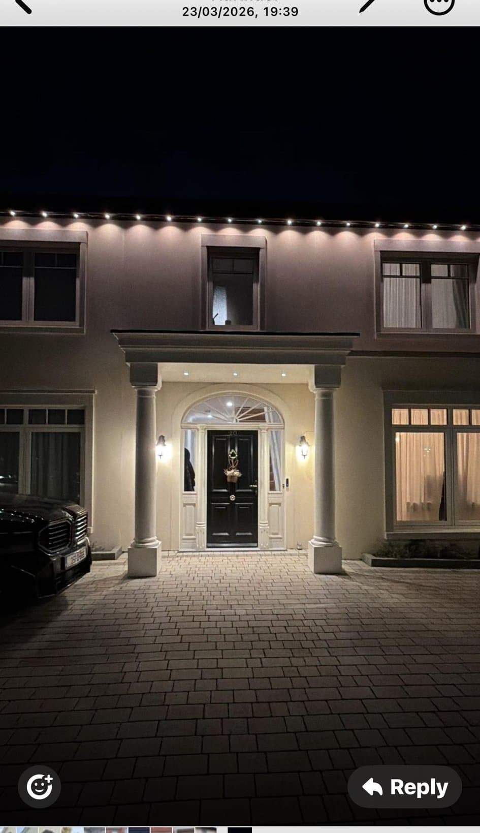 Grand portico canopy with classical columns beautifully lit at night